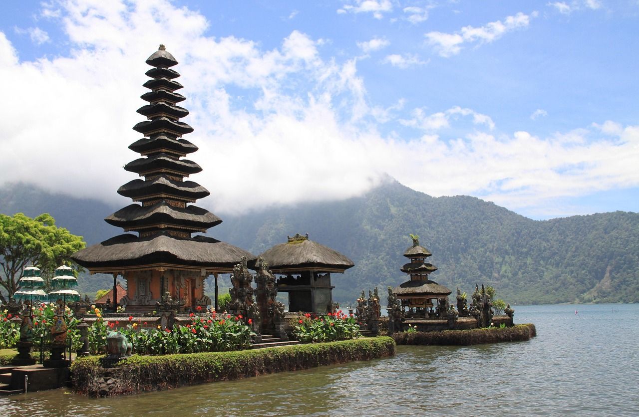A temple on a small island in the middle of a lake in Bali