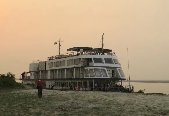 A river ship is docked on the shores of the Brahmaputra river.