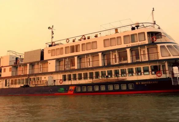 The MV Mahabaahu boat is floating on top of a body of water