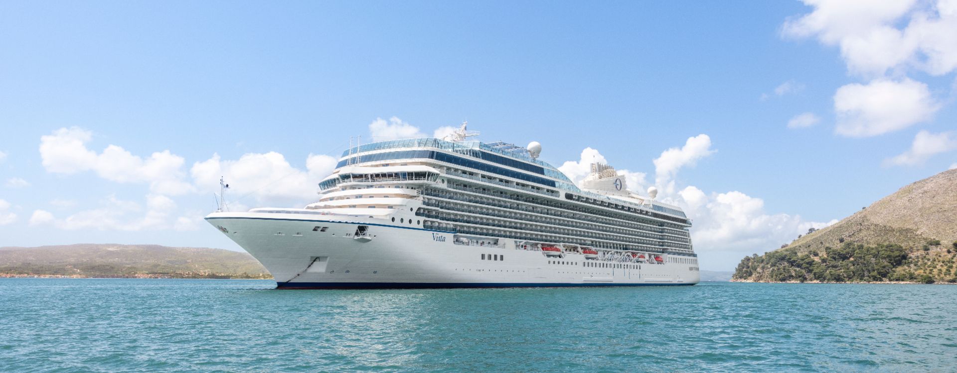 Oceania Cruises Vista is a large cruise ship is floating in the water