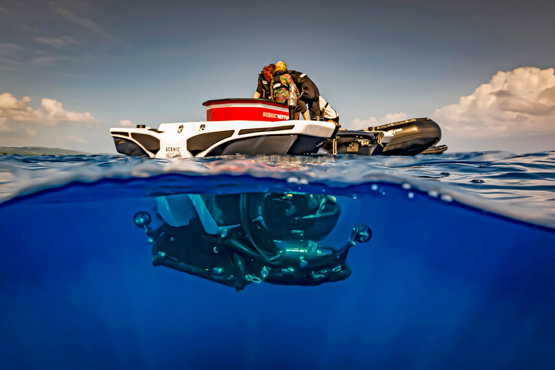 A submarine is floating on top of a body of water in Antarctica