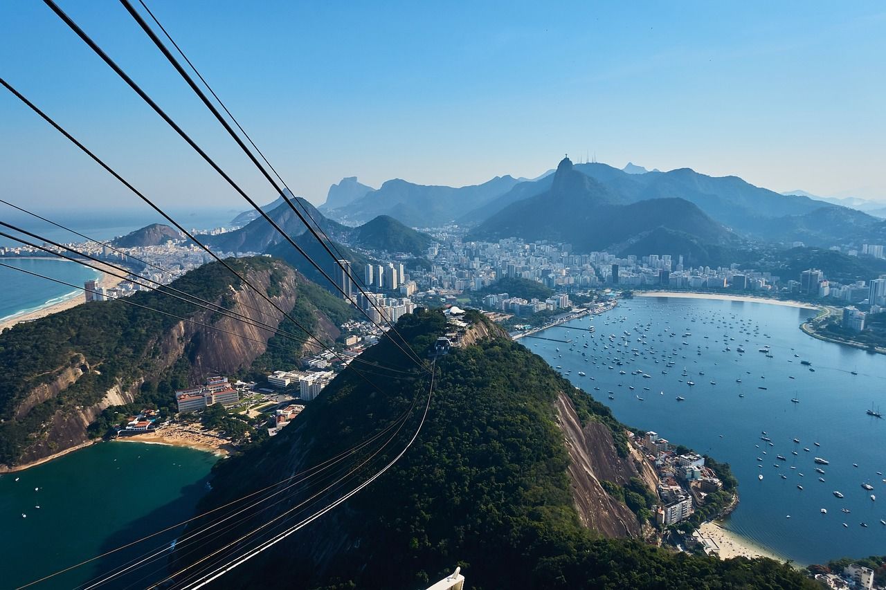 A view of a city from the top of a mountain on a world cruise