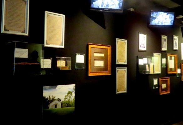 The Trophy Room at Graceland, a wall with a lot of framed pictures on it