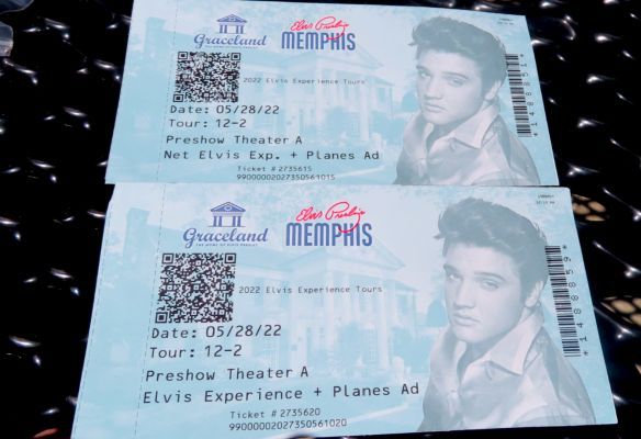 two elvis presley tickets are sitting on a table - Graceland Tickets