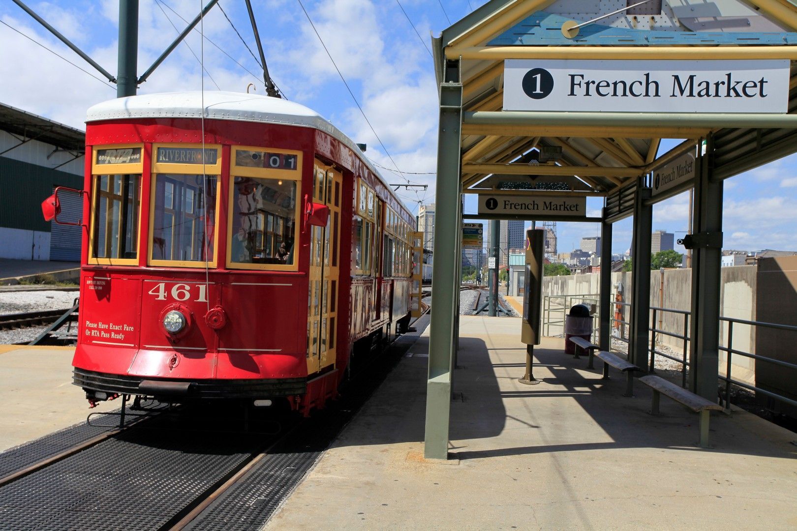 A red trolley number 161 is going to the french market