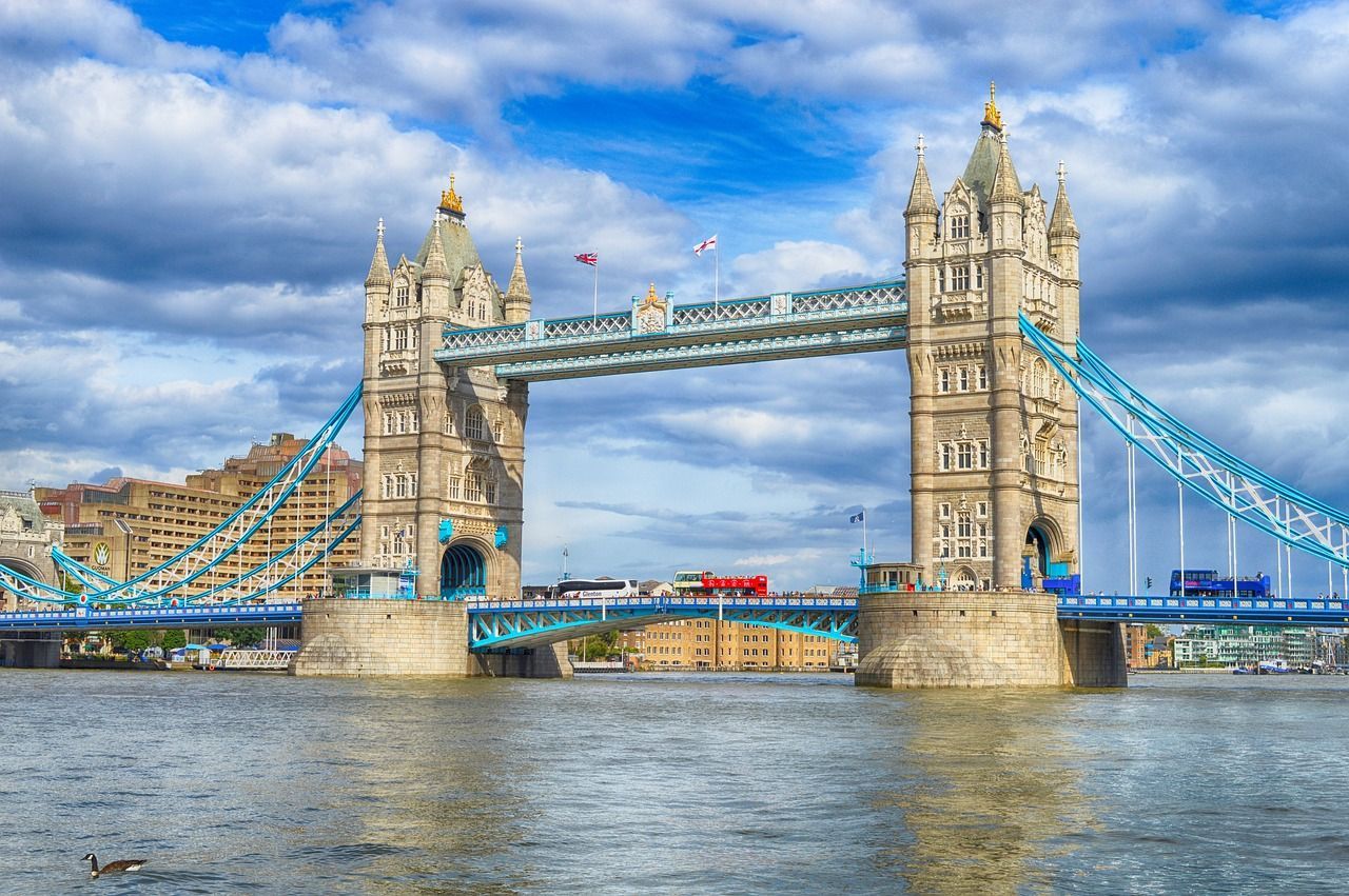 The tower bridge is a suspension bridge over a body of water in london.