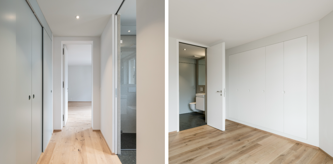 Ein Flur und ein Schlafzimmer mit Holzböden und weißen Wänden.