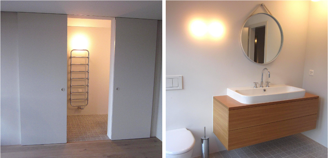 Ein Badezimmer mit Waschbecken, Toilette und Spiegel.