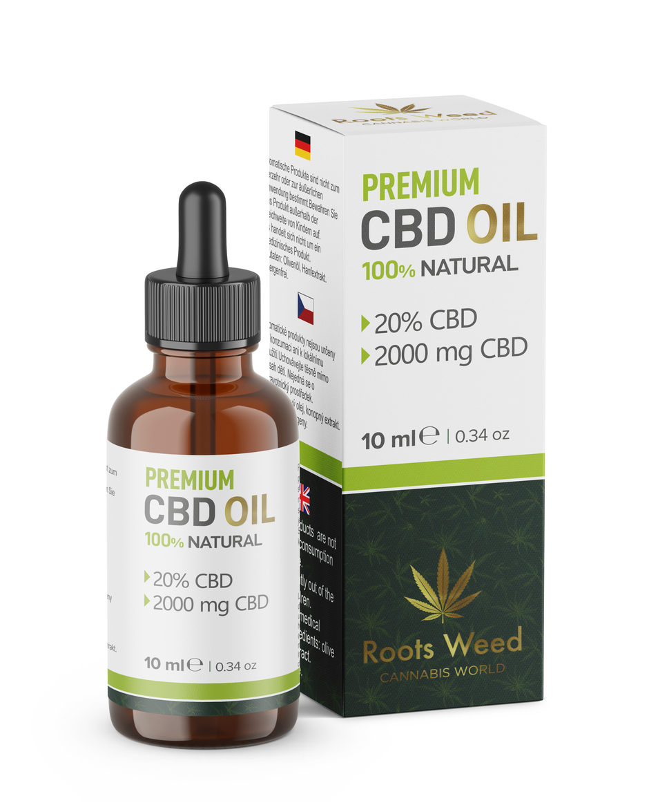 Una botella de aceite de cbd al lado de una caja.
