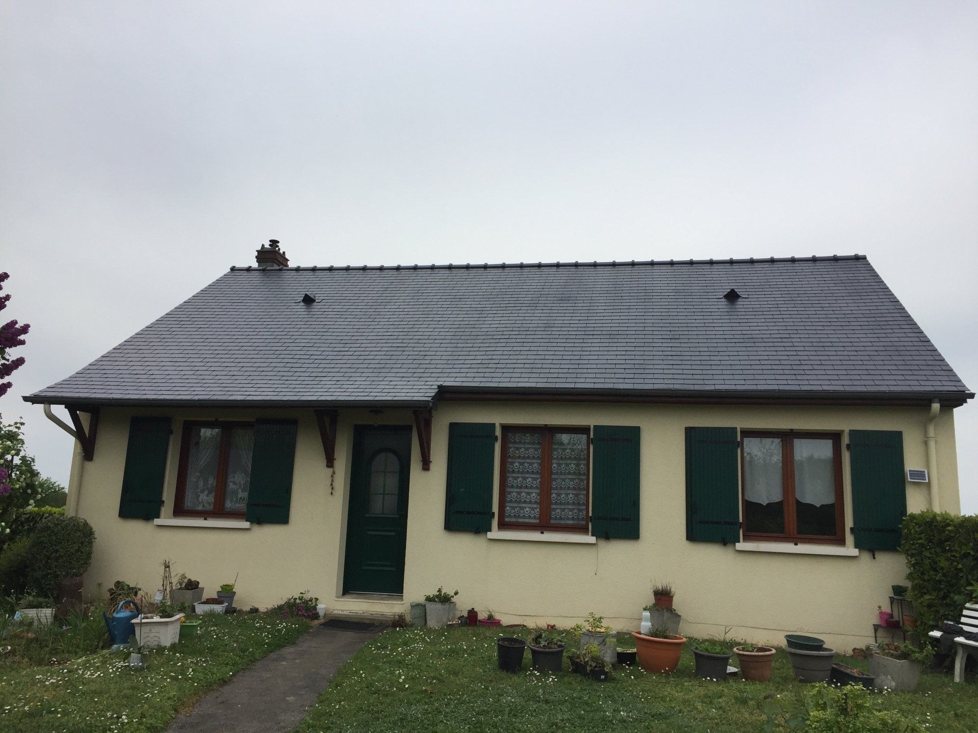 Après démoussage de toiture