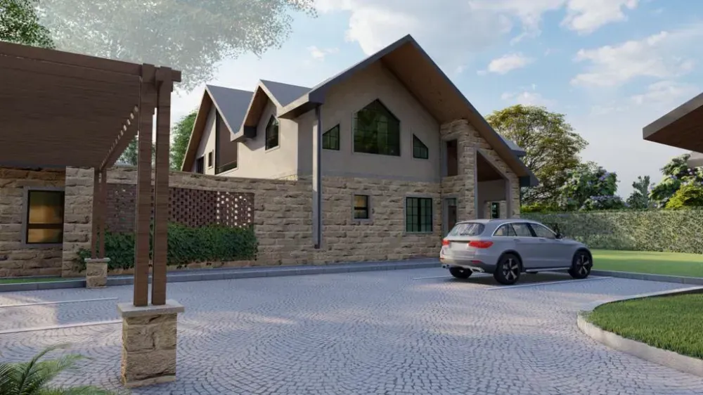 A car is parked in front of a large brick house.