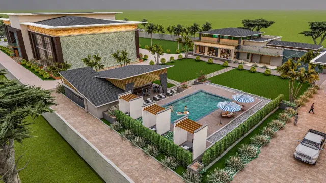 An aerial view of a house with a swimming pool and a car parked in front of it.
