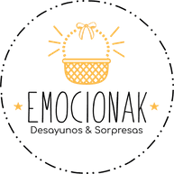 The logo for emocionak desayunos & sorpresas shows a basket with a bow on it.