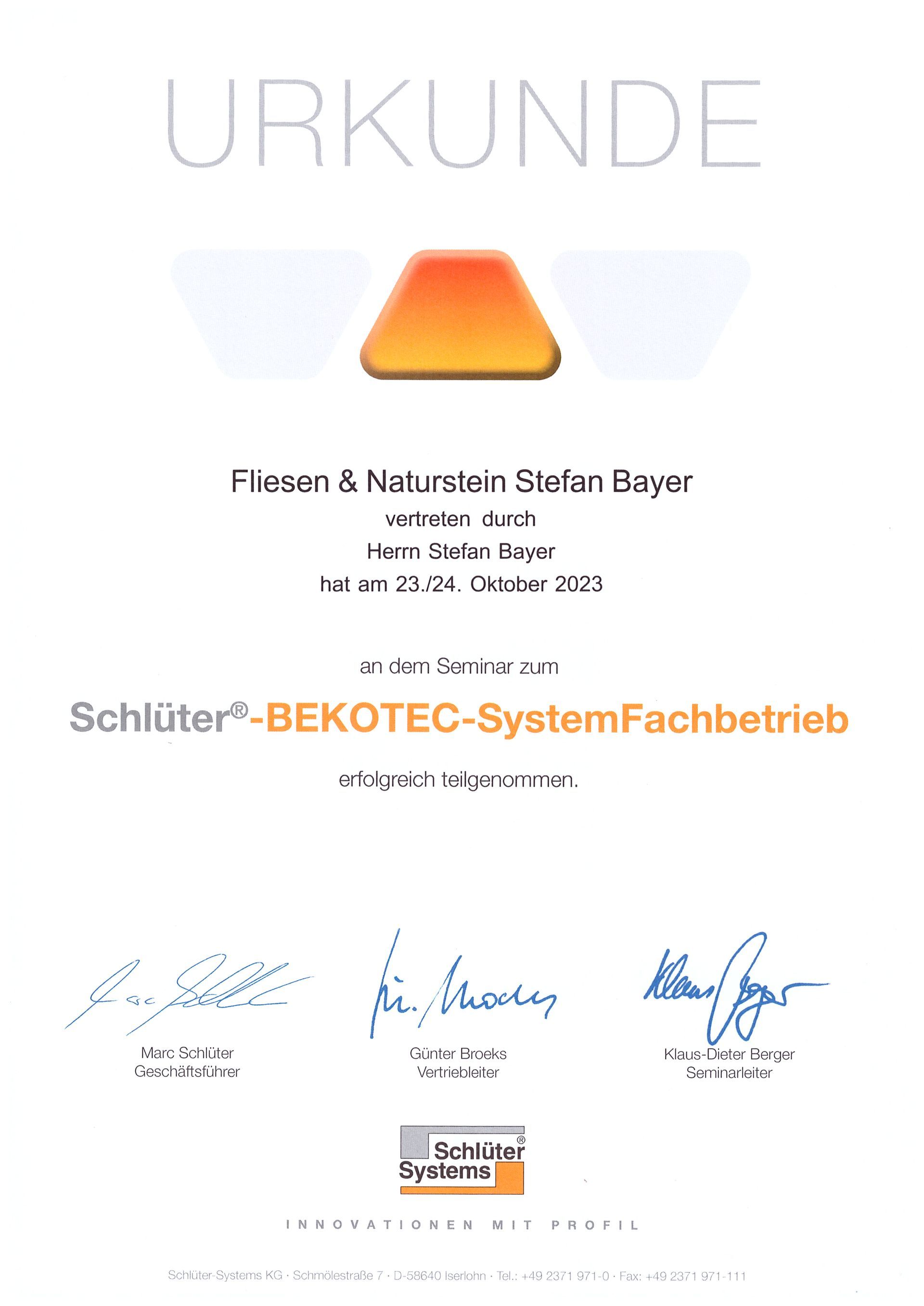 Eine Urkunde mit einem Dreieck und Unterschriften darauf.