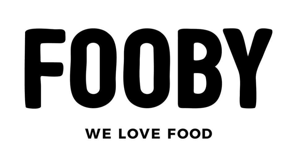 Das Logo von Fooby ist schwarz-weiß und sagt „We love food“.