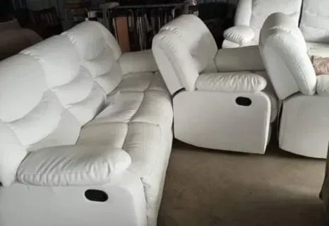 A row of servers are being installed in a data center.