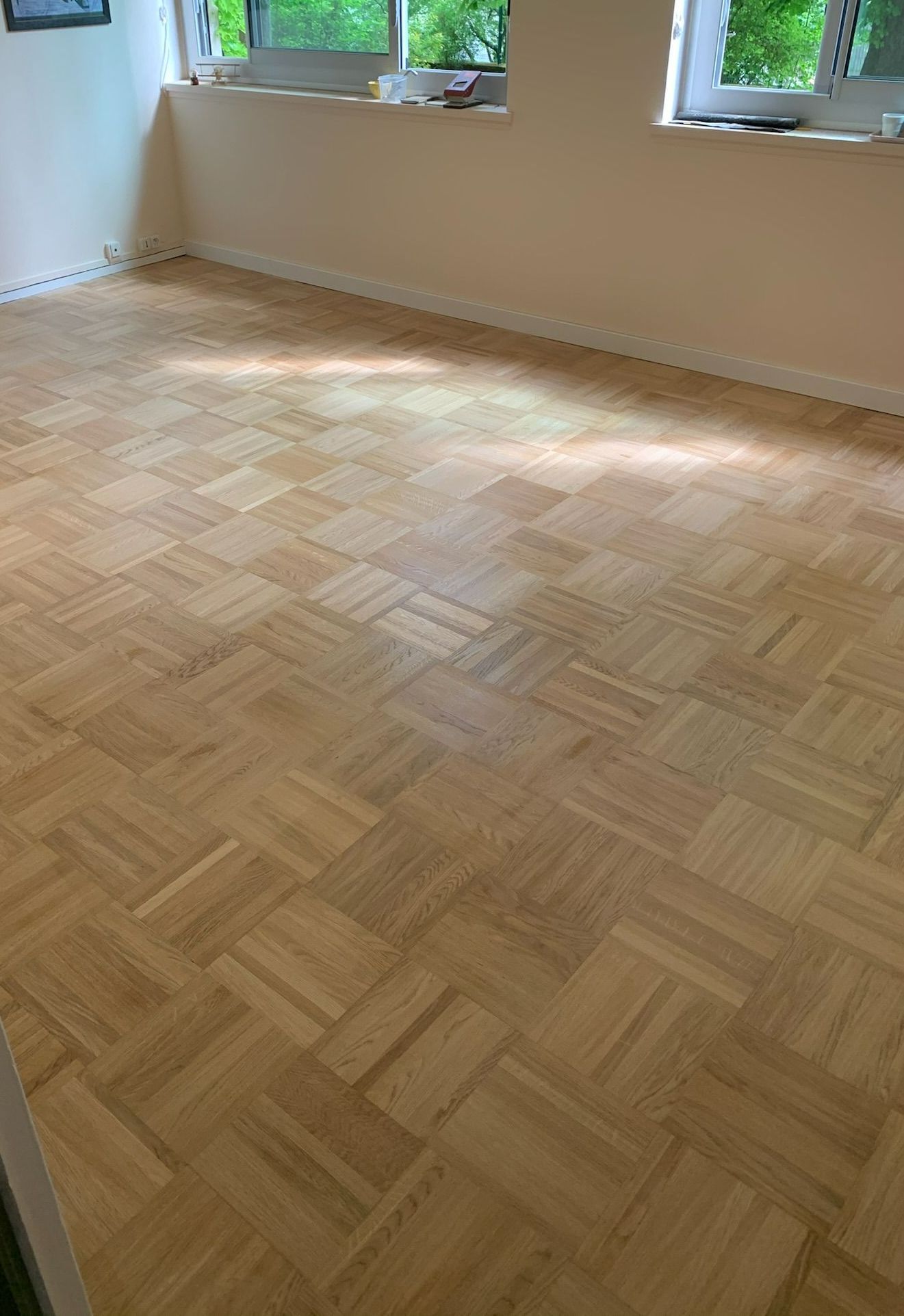 Parquet à bâton rompu collé