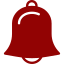 Una campana roja con un mango blanco sobre un fondo blanco.