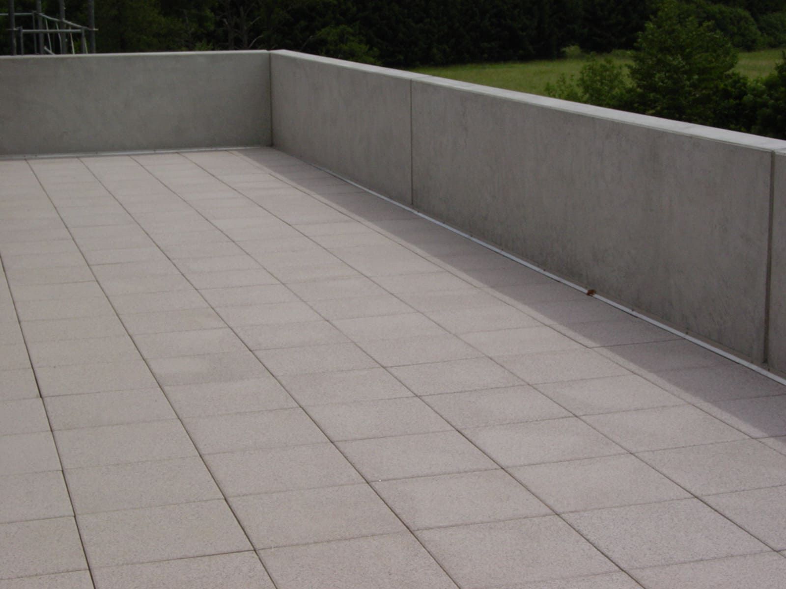 Toiture terrasse en dalles de ciment