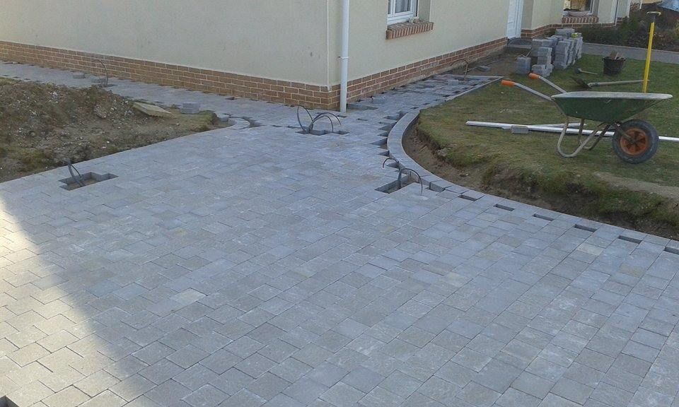 Pose de pavés en arrondi