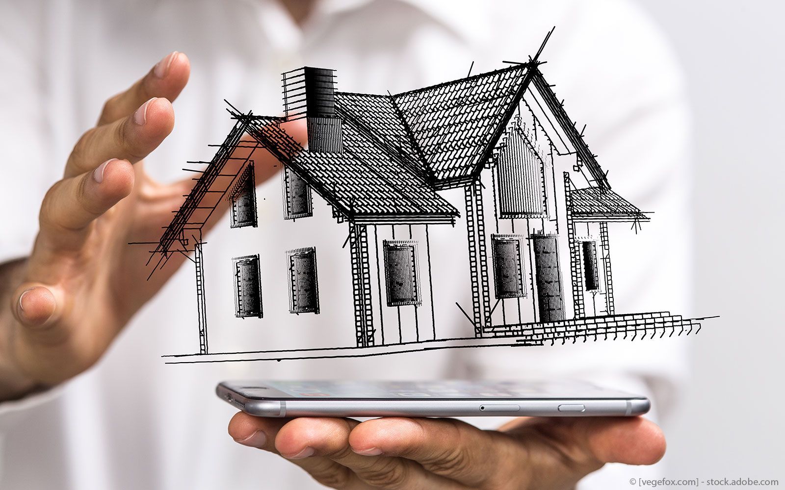 Eine Gruppe Männer arbeitet auf dem Dach eines Gebäudes.