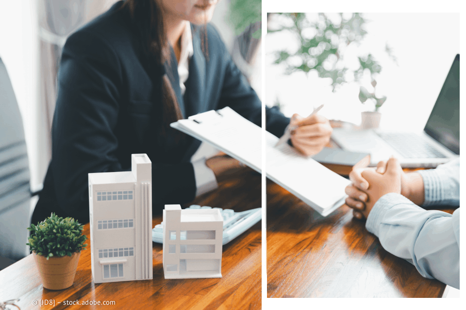 Zwei Personen diskutieren an einem Schreibtisch Dokumente mit Modellgebäuden, Anlagen und Taschenrechner.