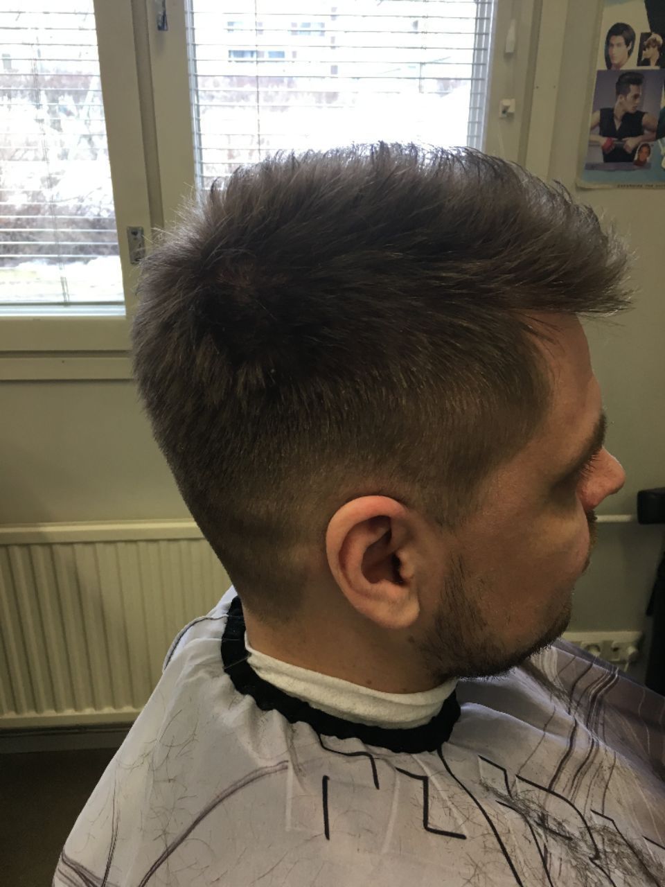 Lyhyt miesten hiusmalli