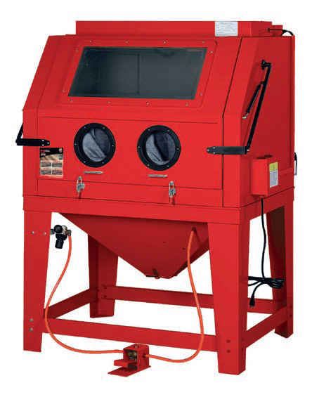 Cabina de arenado roja con guantes, ventana y pedal.