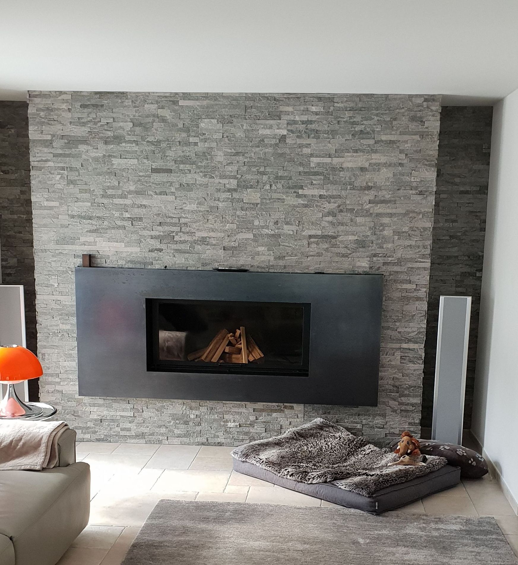 Rauner AG Plattenbeläge + Cheminéebau