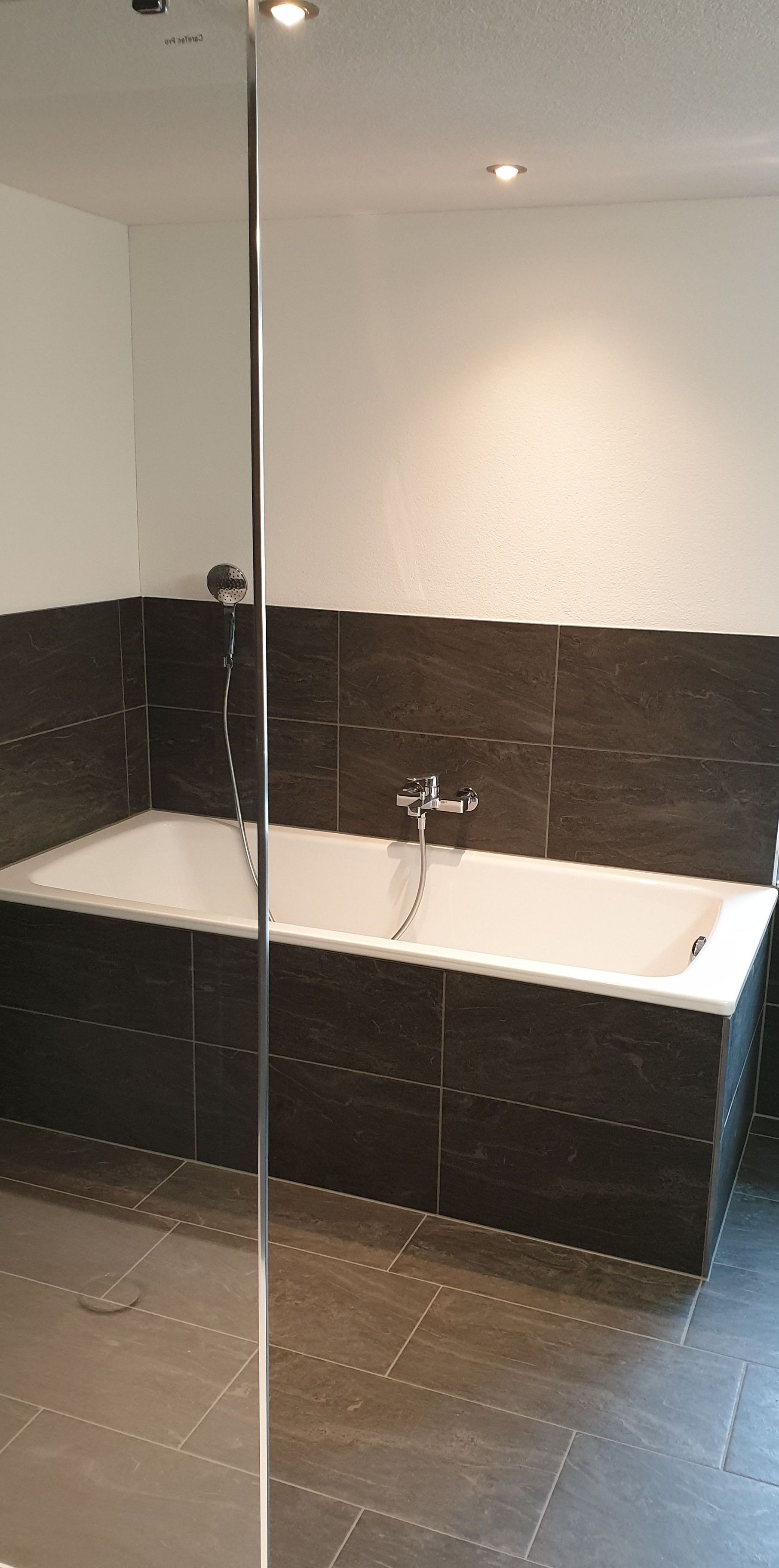 Rauner AG Plattenbeläge + Cheminéebau