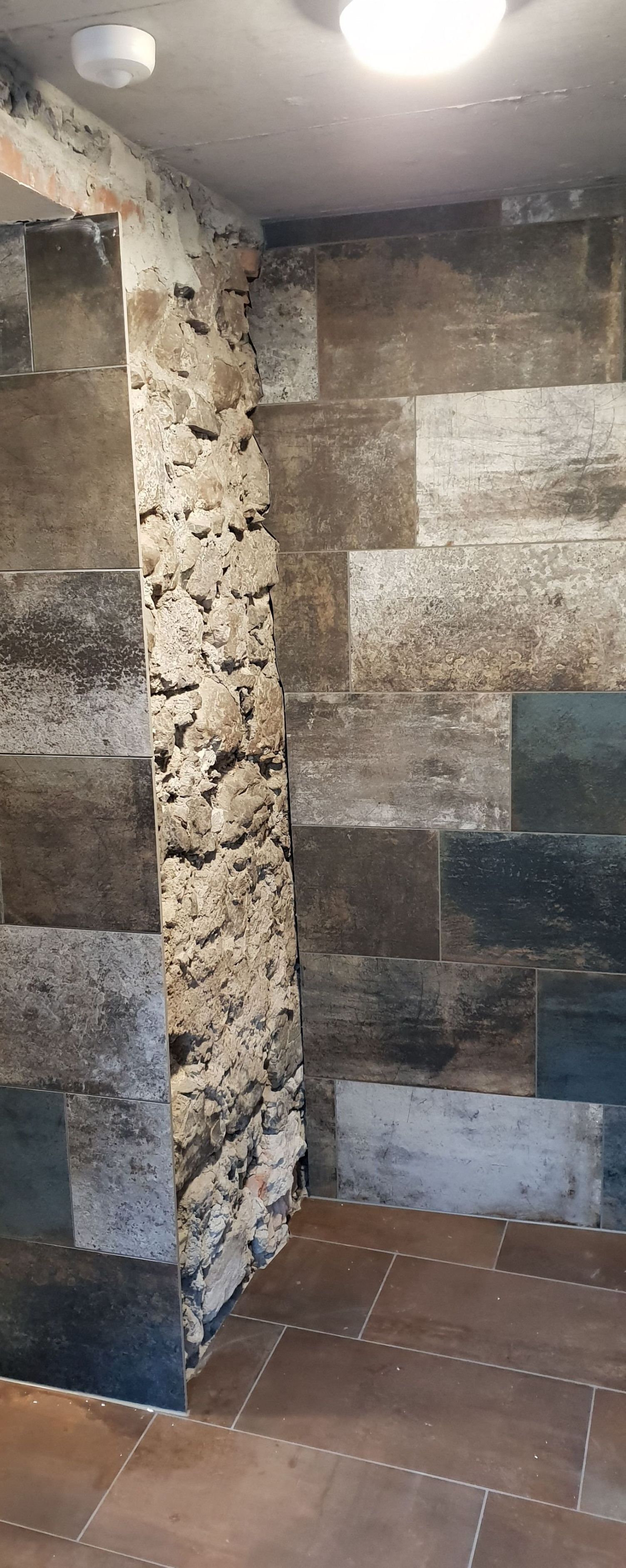 Rauner AG Plattenbeläge + Cheminéebau