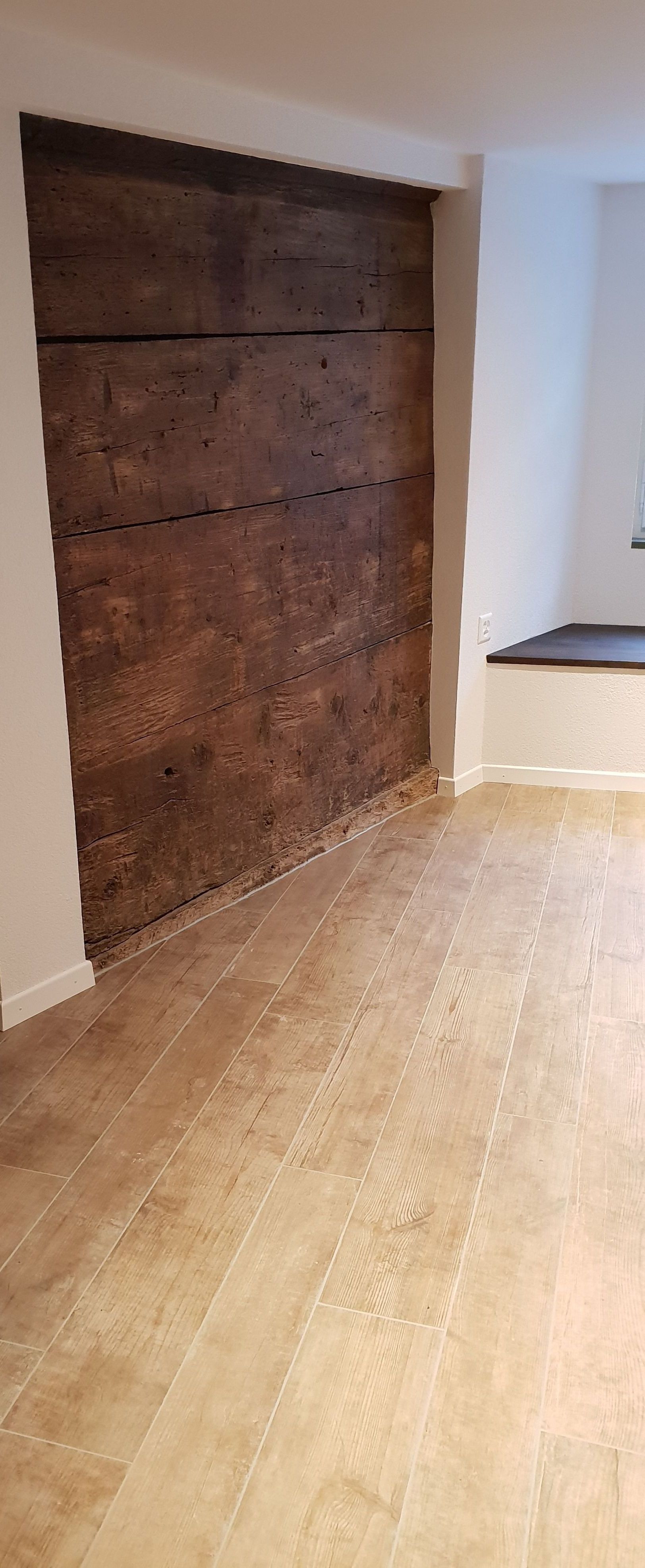 Rauner AG Plattenbeläge + Cheminéebau