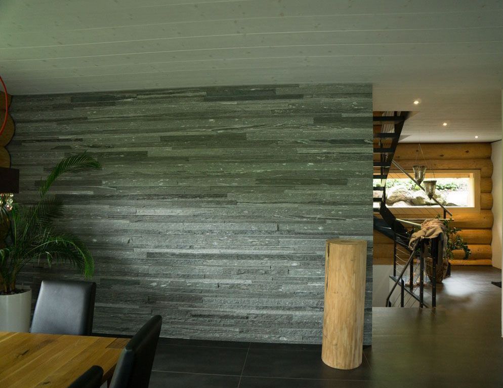 Rauner AG Plattenbeläge + Cheminéebau