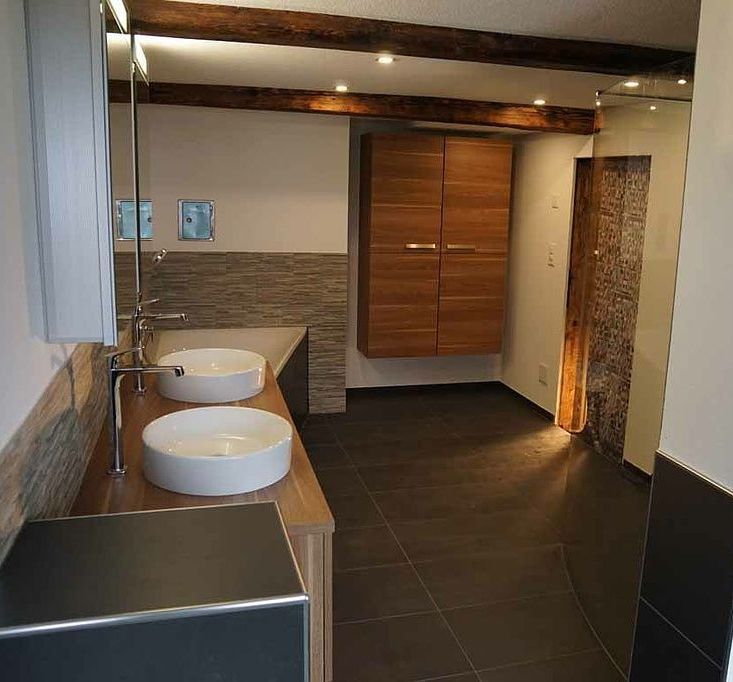 Rauner AG Plattenbeläge + Cheminéebau