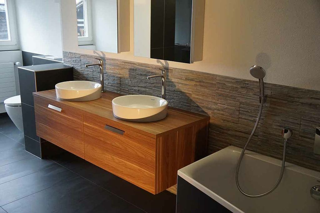 Rauner AG Plattenbeläge + Cheminéebau