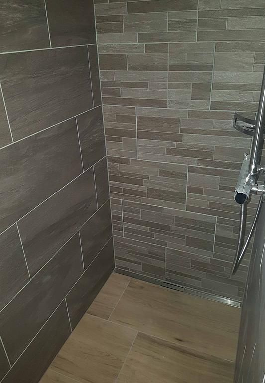 Rauner AG Plattenbeläge + Cheminéebau