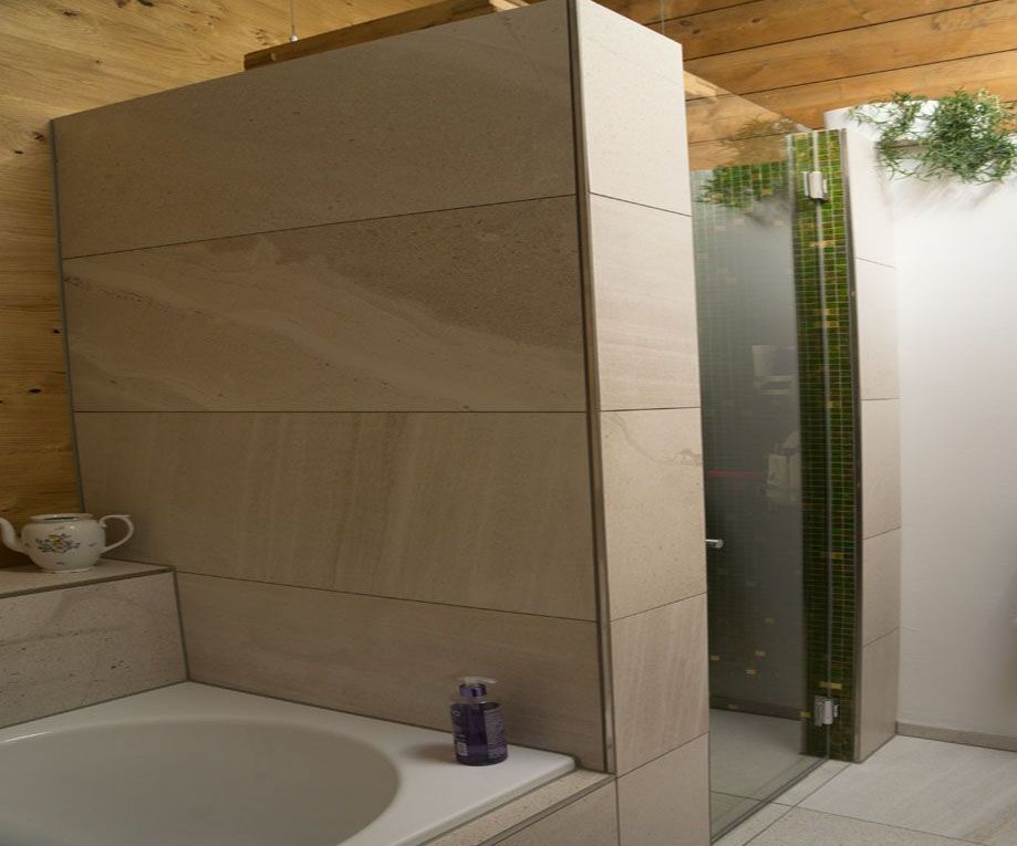 Rauner AG Plattenbeläge + Cheminéebau