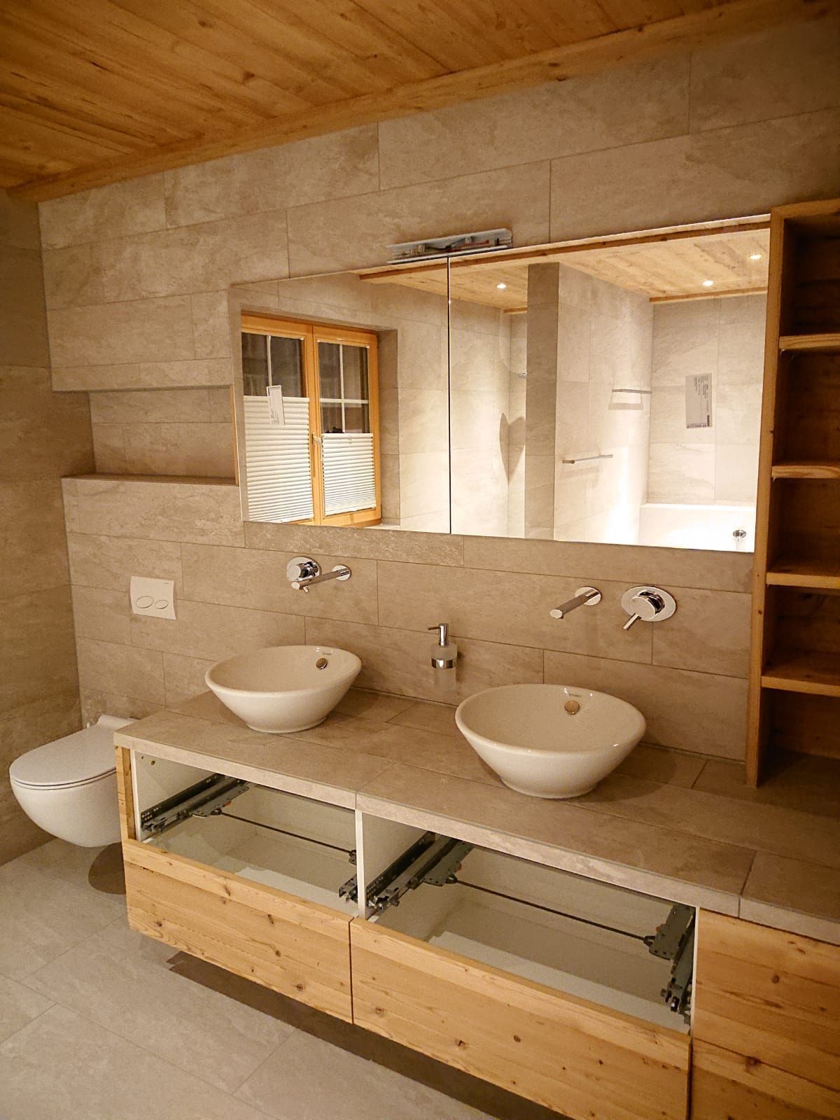 Rauner AG Plattenbeläge + Cheminéebau