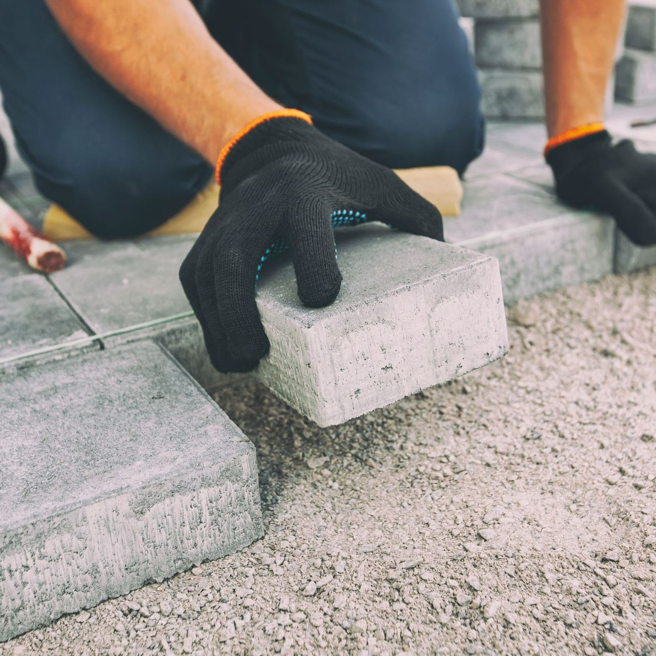 Pose d'un pavé