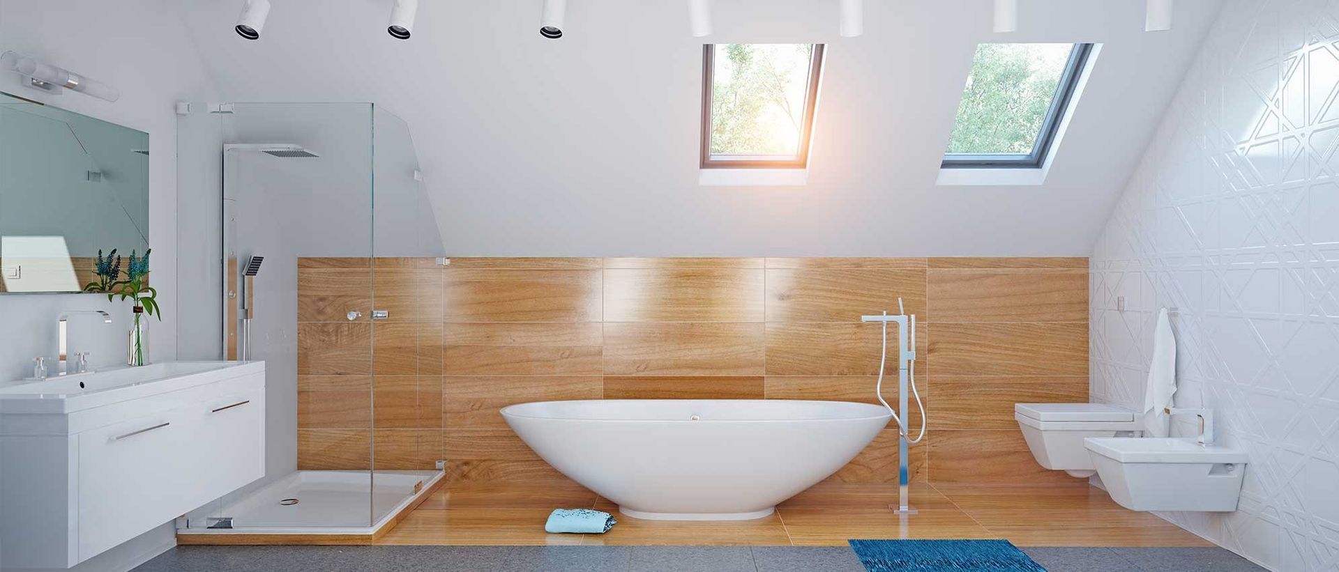 Un baño con bañera, lavabo, inodoro y claraboya.