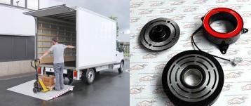 Un hombre está cargando cajas en un camión blanco.