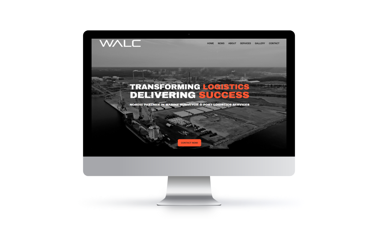Tietokoneen näyttö, jossa näkyy WALC-yrityksen verkkosivusto mustavalkoisella teollisella taustalla ja oranssilla tekstillä.