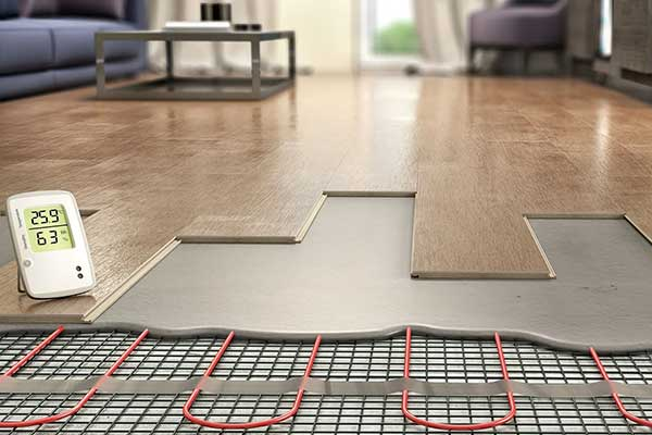 Plancher chauffant en construction