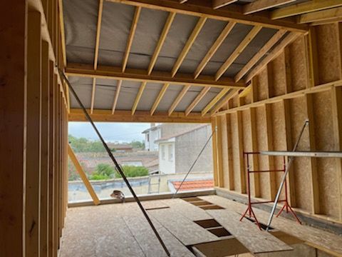Charpente fermette pour intérieur lors d'une surélévation