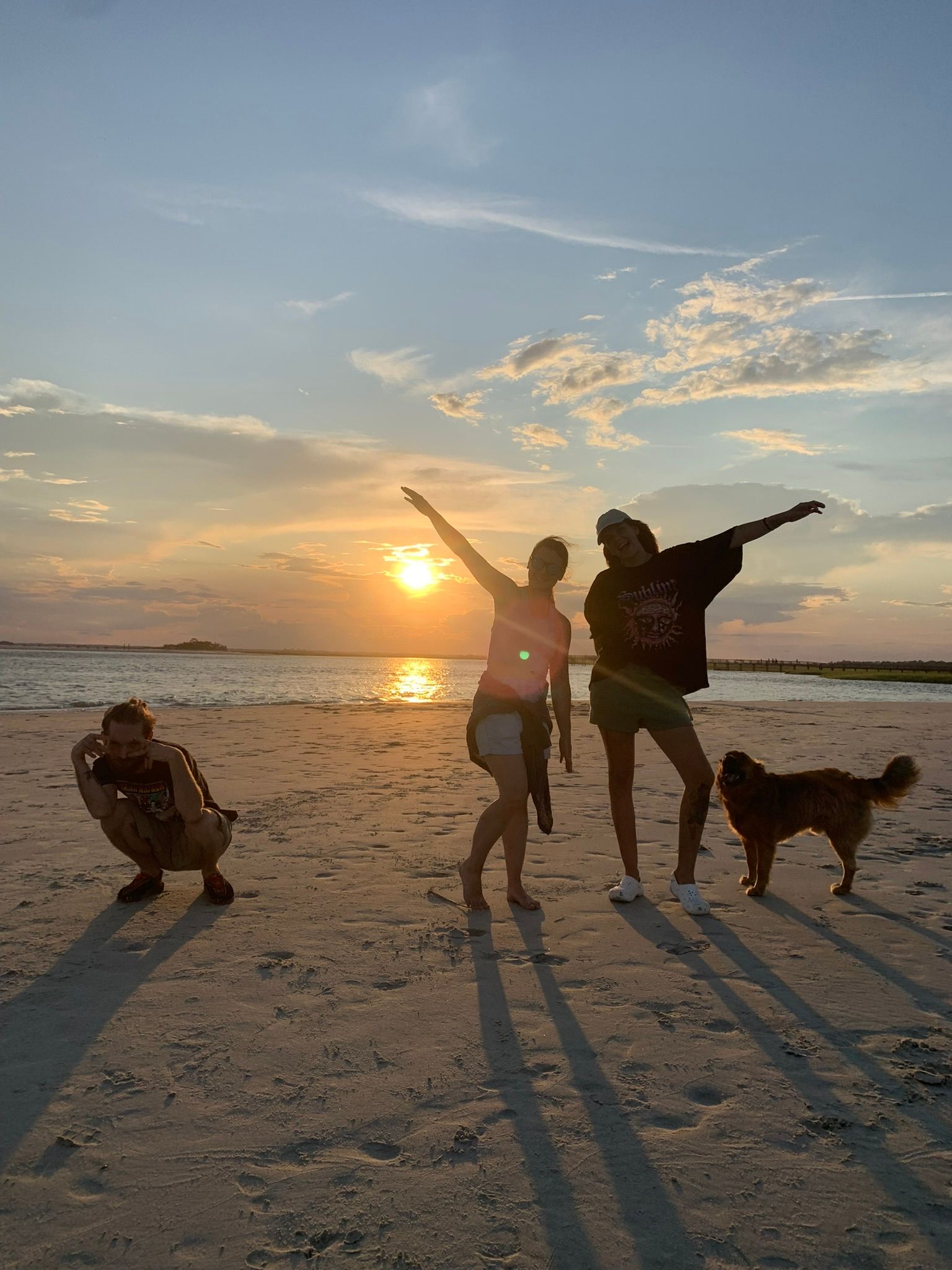 Modern white house with rectangular pool reflecting a clear blue sky.