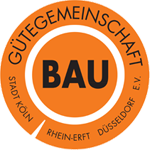 Ein orangefarbener Kreis mit dem Wort „Bau“ darauf