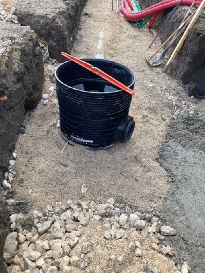 Création d'une tranchée pour la pose d'une canalisation.