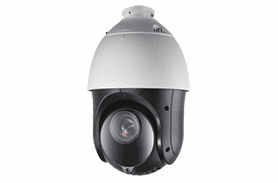 Una cámara de seguridad está colocada sobre una superficie blanca.