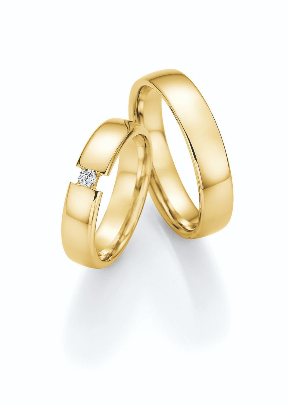 Einfarbige Hochzeitsringe in Gelbgold mit Stein