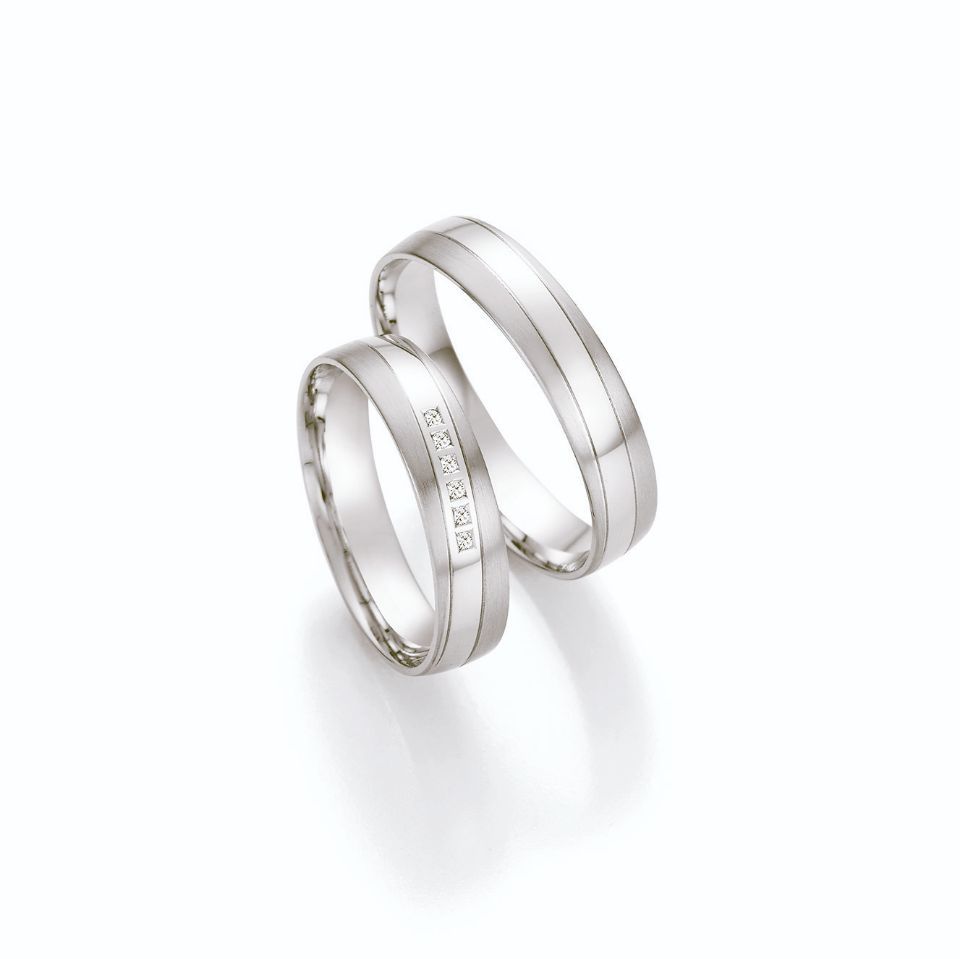 Einfarbige Hochzeitsringe in Silber mit Steinen